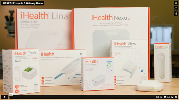Load video: Product demonstration of the VITAdLS Gateway being used in conjunction with compatible iHealth medical devices, including iHealth blood pressure cuffs, pulse oximeter, forehead thermometer, and weight scale.